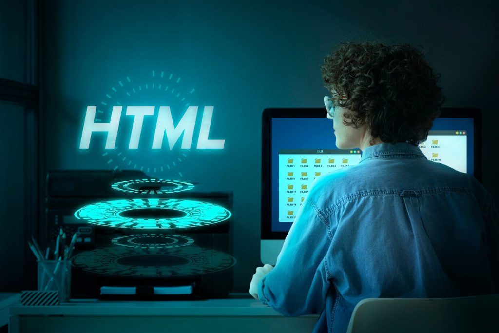 A boy working on the computer screen and looking the hologram of HTML
